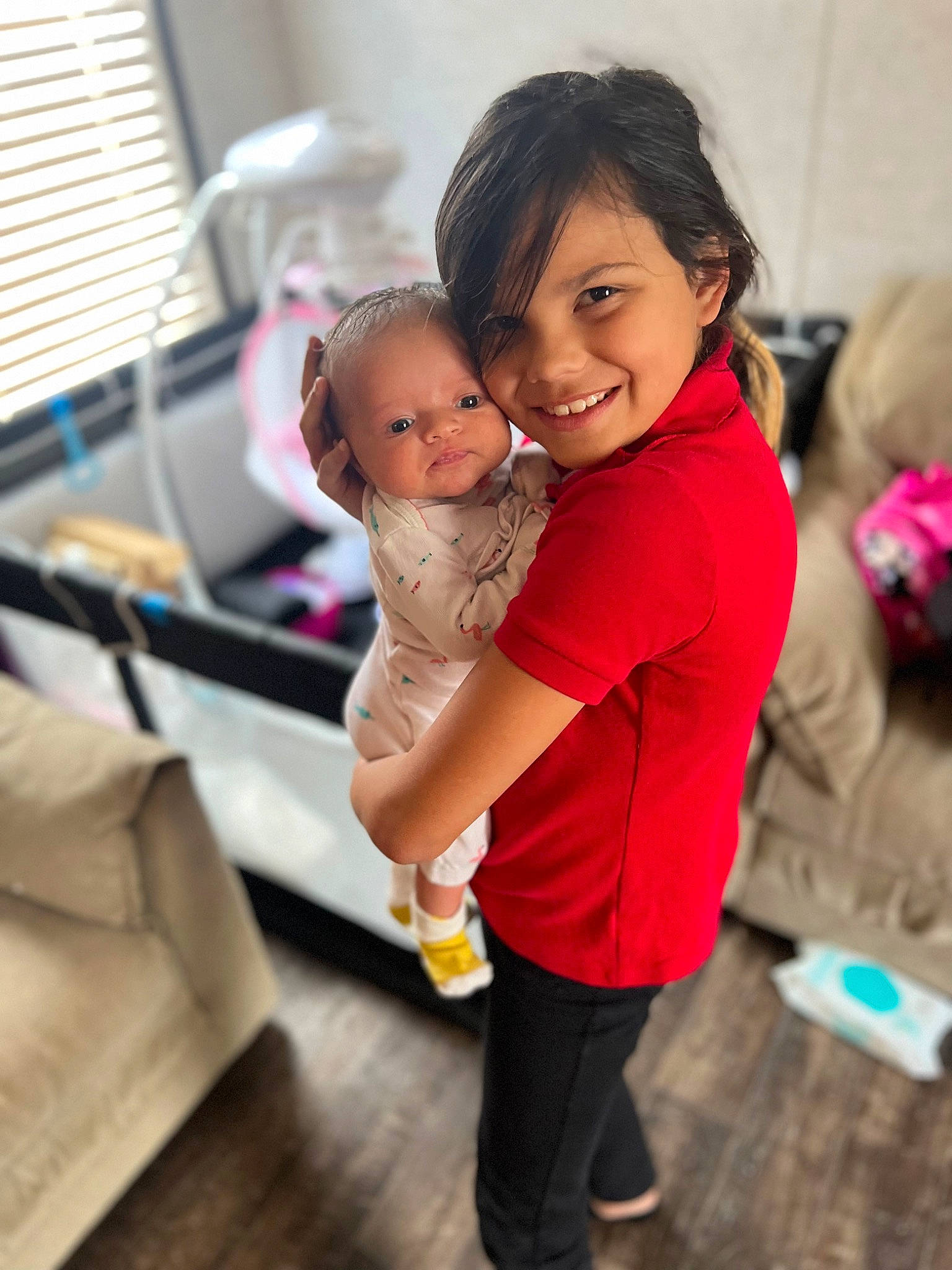 Alayna joined the competition — help win amazing prizes! abdomen, baby, bag, child, comfort, event, floor, flooring, fun, gesture, happy, joy, leg, leisure, luggage_and_bags, person, room, sitting, smile, t_shirt