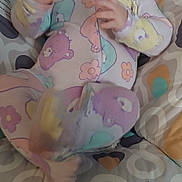 Hazel joined the competition — help win amazing prizes! baby, smiling, pajamas, baby_rocker, toddler, happy, infant, clothing, face, hands, footwear, indoor, person, cute, pattern, colorful, seat, comfort, child, expression