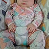 Hazel joined the competition — help win amazing prizes! baby, sleeping, pajamas, floral_pattern, baby_rocker, infant, peaceful, child, cute, resting, soft_lighting, indoor, comfortable, small_hands, closed_eyes, hair, face, seat, fabric, cozy