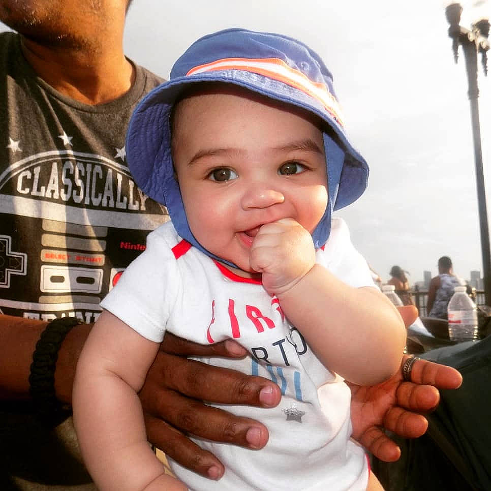 Franklin is registered to the contest to win money with this photo: child, headwear, joy, person, thumb, toddler