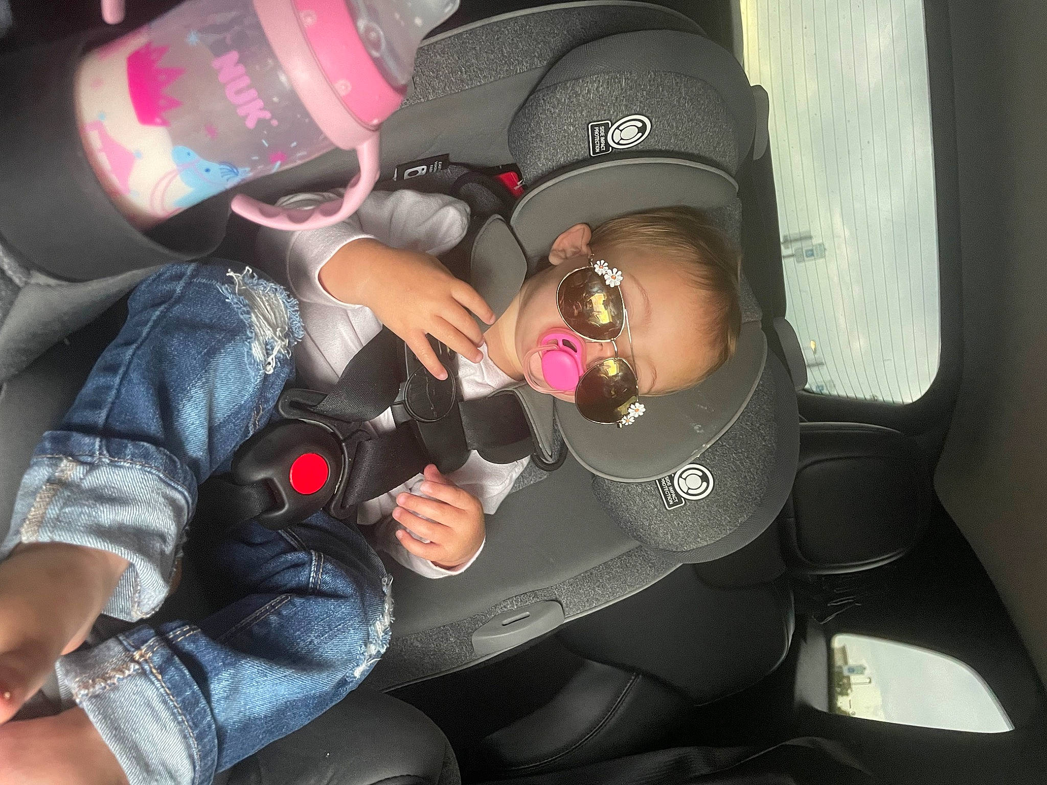 Raylain Vaness is registered to the contest to win money with this photo: arm, auto_part, automotive_design, automotive_lighting, car, car_seat, car_seat_cover, comfort, finger, hand, helmet, human_body, jeans, joint, motor_vehicle, nail, person, seat_belt, steering_wheel, thigh
