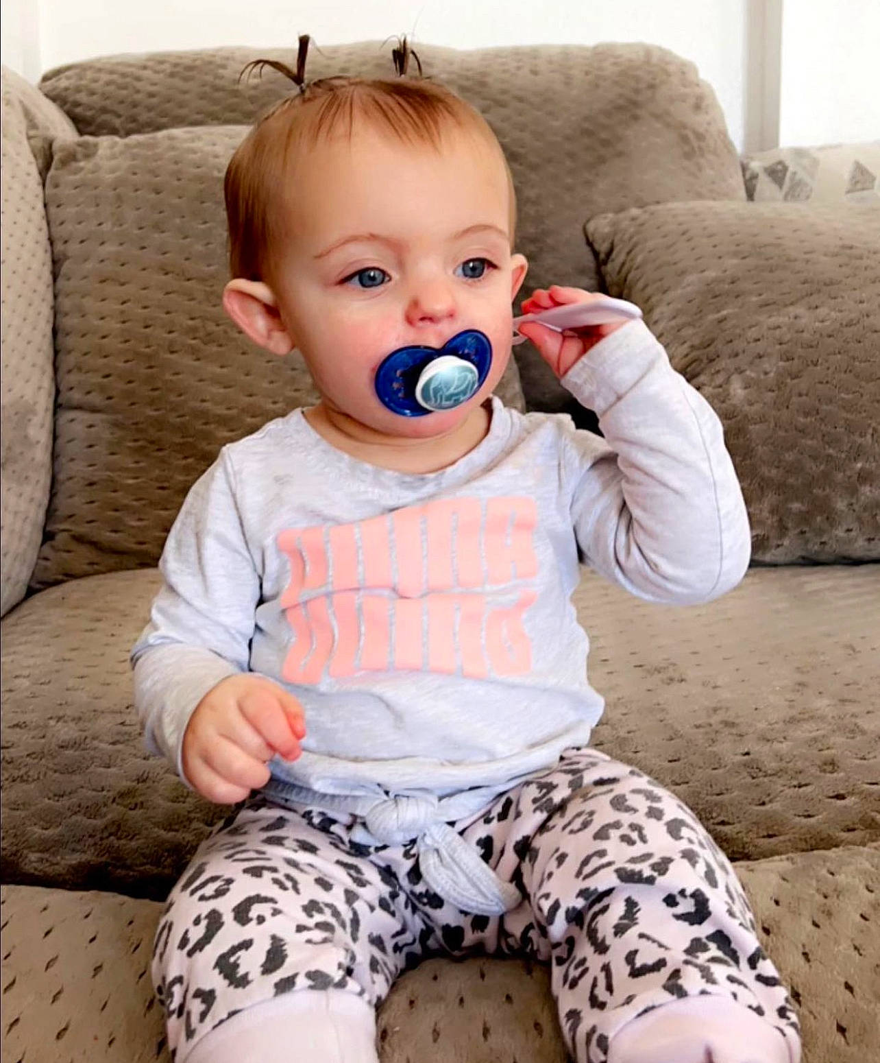 Raylain Vaness joined the competition — help win amazing prizes! baby, baby_toddler_clothing, blue, cheek, child, chin, comfort, couch, eye, face, happy, head, iris, pattern, person, skin, sleeve, sportswear, thigh, toddler