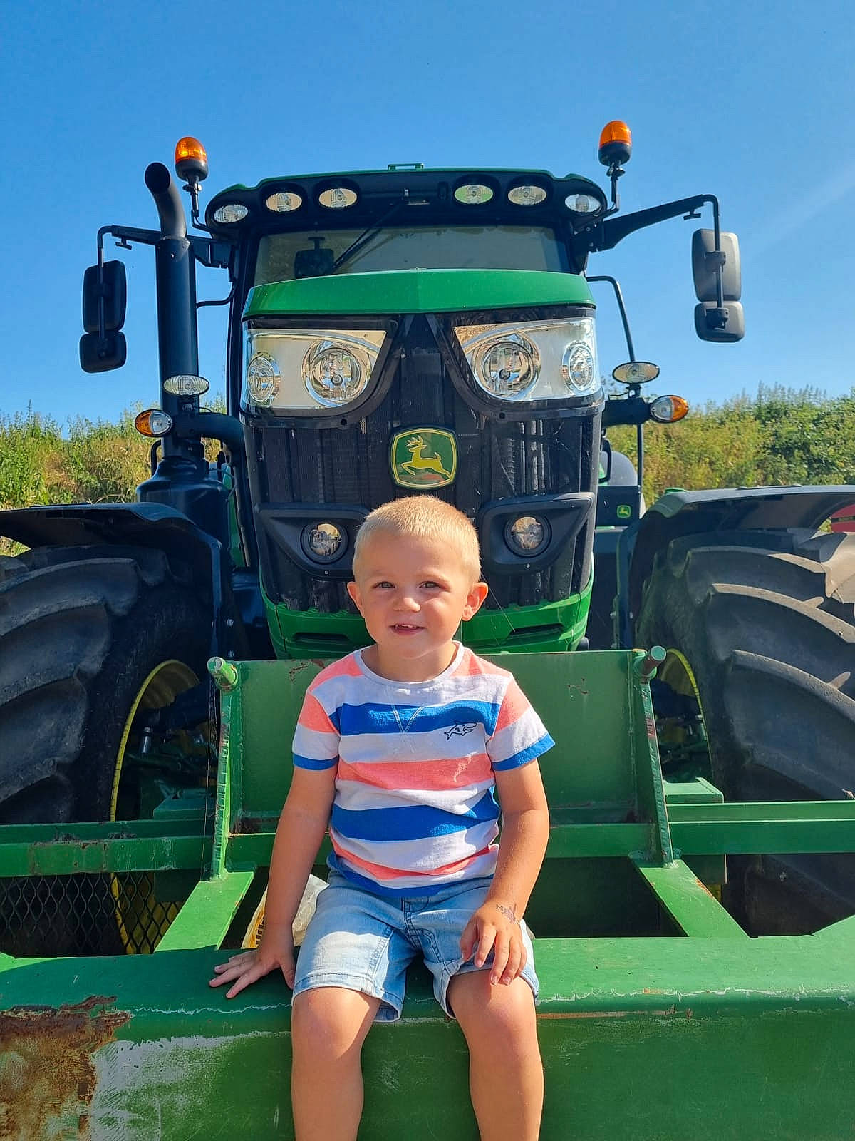 Oliver joined the competition — help win amazing prizes! agricultural_machinery, agriculture, automotive_design, automotive_exterior, automotive_tire, automotive_wheel_system, bumper, fender, grass, grassland, joy, motor_vehicle, person, plant, rolling, rural_area, sky, tire, tractor, tread