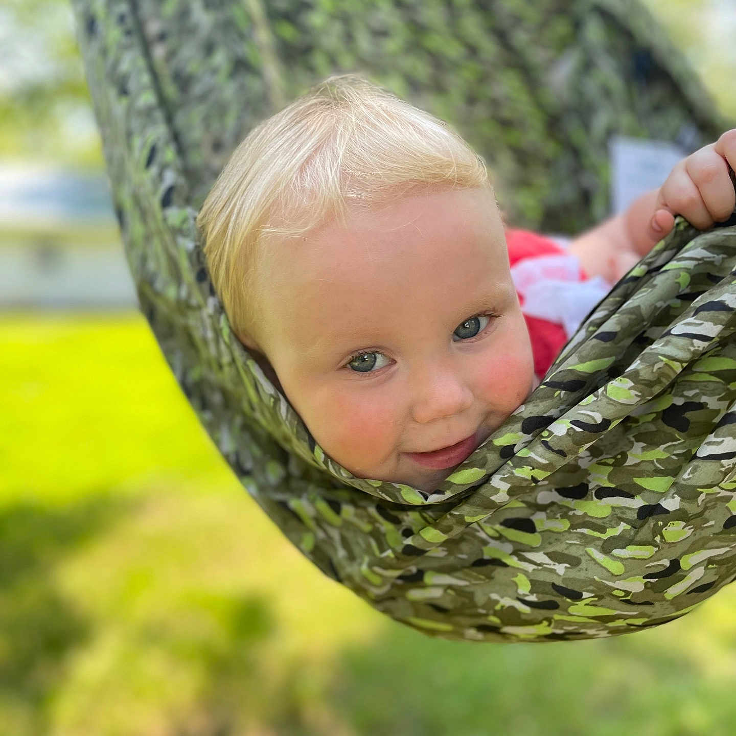 Layla is registered to the contest to win money with this photo: animal, baby, backyard, face, furniture, grass, hammock, head, nature, outdoors, person, photography, plant, portrait, reptile, sitting, sleeping, snake, tree, yard