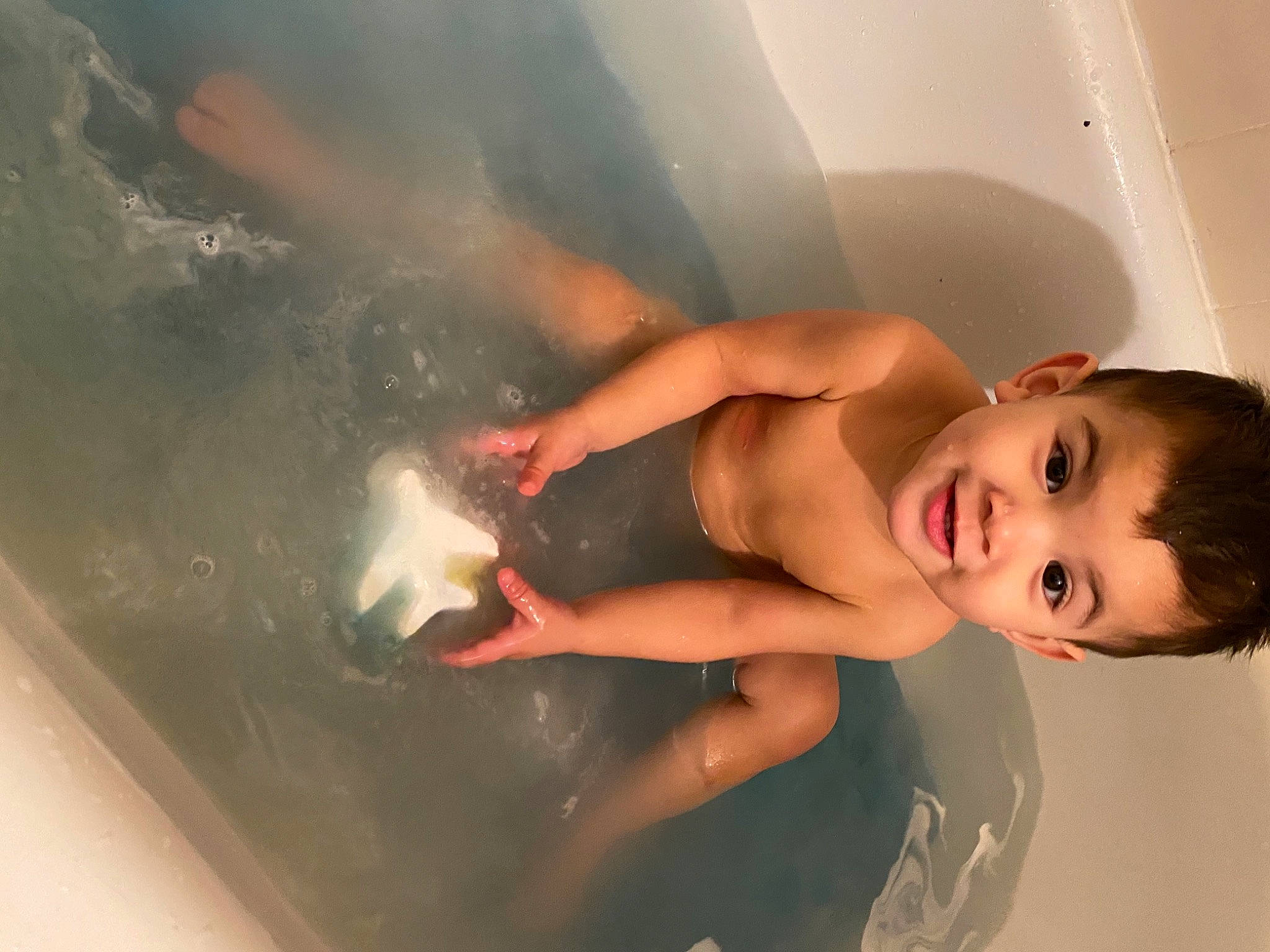 David is registered to the contest to win money with this photo: baby_bathing, barechested, bathing, bathroom, bathtub, cheek, chest, fluid, foam, fun, joint, liquid, muscle, organ, person, photography, plumbing, skin, snapshot, stomach
