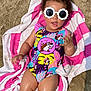 toddler, child, beach, sand, sunglasses, swimsuit, colorful, towel, playful, sunny, summer, outdoor, cute, fashion, relaxing, fun, person, feet, legs, hands