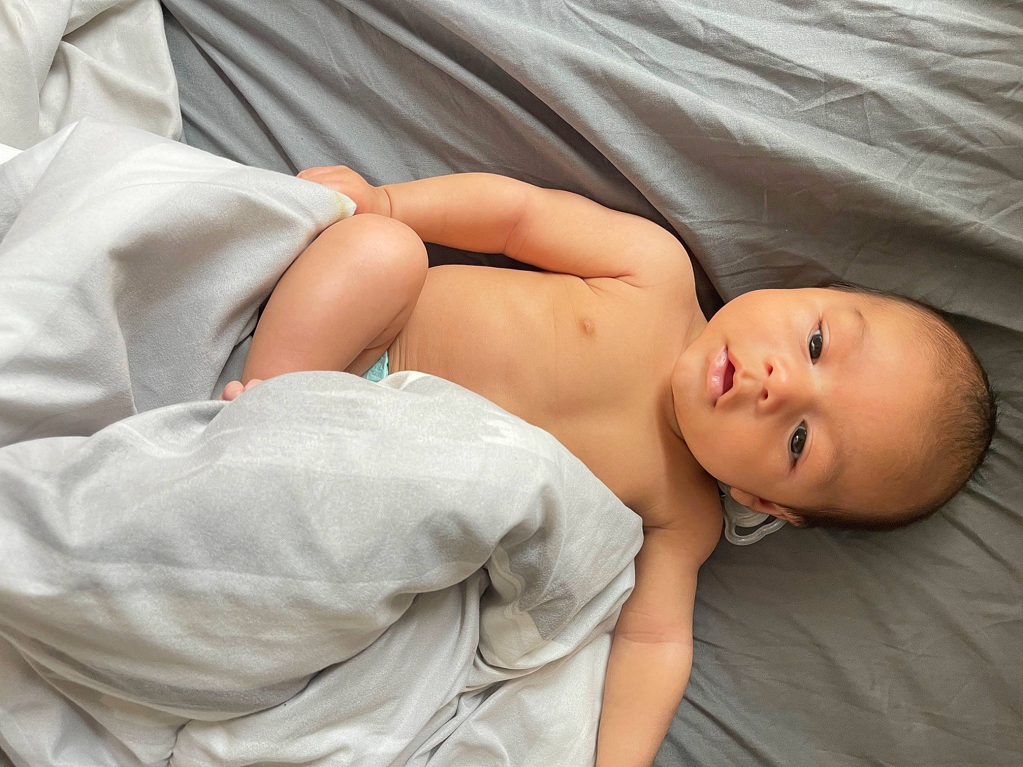 Jahviel joined the competition — help win amazing prizes! abdomen, baby, bed, bedding, chest, child, comfort, diaper, elbow, human_body, human_leg, joint, knee, linens, muscle, person, skin, stomach, thigh, toddler