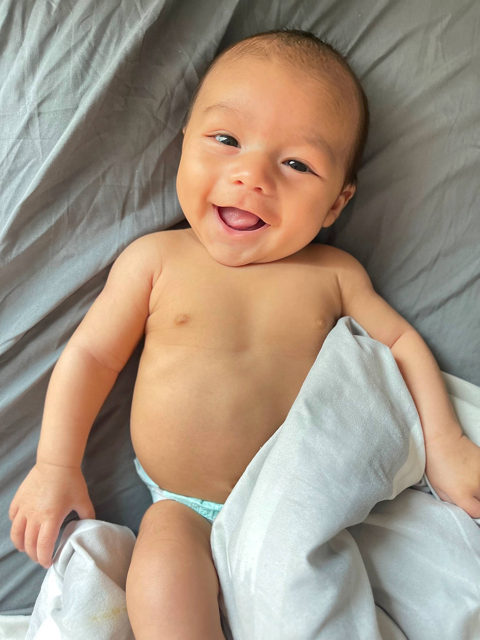 Jahviel joined the competition — help win amazing prizes! abdomen, baby, baby_toddler_clothing, cheek, chest, child, comfort, eye, finger, happy, head, human_body, linens, person, skin, smile, stomach, thigh, thumb, toddler