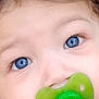 adorable, baby, blue, blue_eyes, child, close_up, clothing, cute, expression, face, green, hair, infant, mouth, nose, pacifier, person, portrait, skin, young