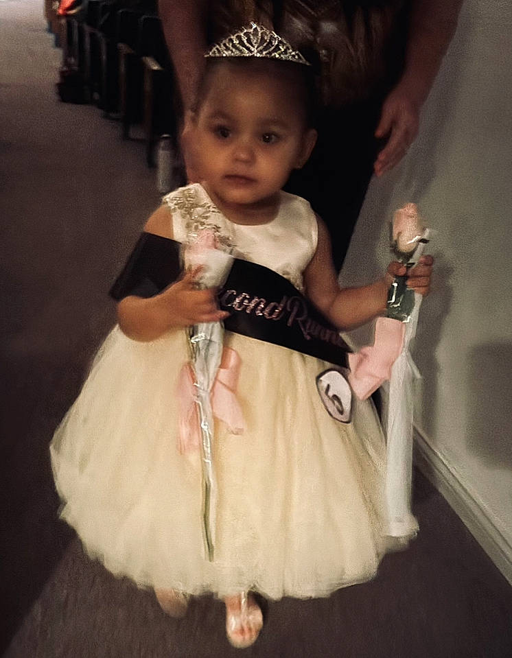 Timberlyn joined the competition — help win amazing prizes! baby, baby_toddler_clothing, beauty, child, costume, dress, event, fashion_accessory, fashion_design, flooring, formal_wear, fun, fur, happy, jewellery, person, pink, sitting, skin, sleeve