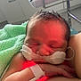 Kalel participe au concours pour gagner de l'argent avec cette photo : newborn, baby, sleeping, hospital, medical_tubes, blanket, infant, face, arm, skin, healthcare, patient, care, rest, peaceful, closeup, person, bed, neonatal, monitoring