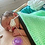 Kalel participe au concours pour gagner de l'argent avec cette photo : baby, sleeping, blanket, pacifier, necklace, skin, hand, face, hospital, tube, medical, newborn, resting, closeup, comfort, infant, person, soft, tender, care