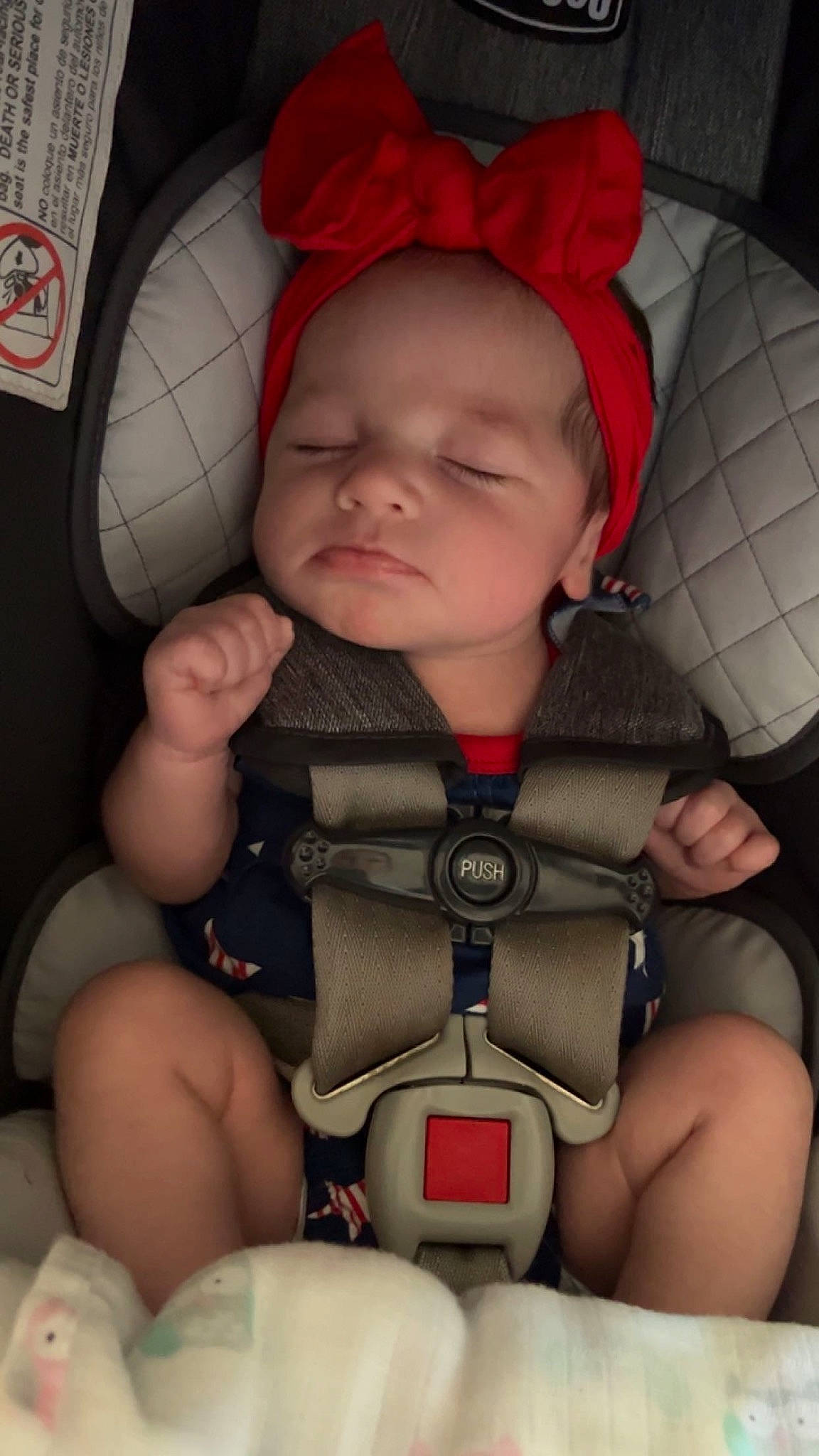 Paityn is registered to the contest to win money with this photo: arm, baby, baby_carriage, baby_toddler_clothing, car_seat, cheek, child, comfort, finger, headwear, human, joint, mouth, nail, nose, organ, person, product, red, skin