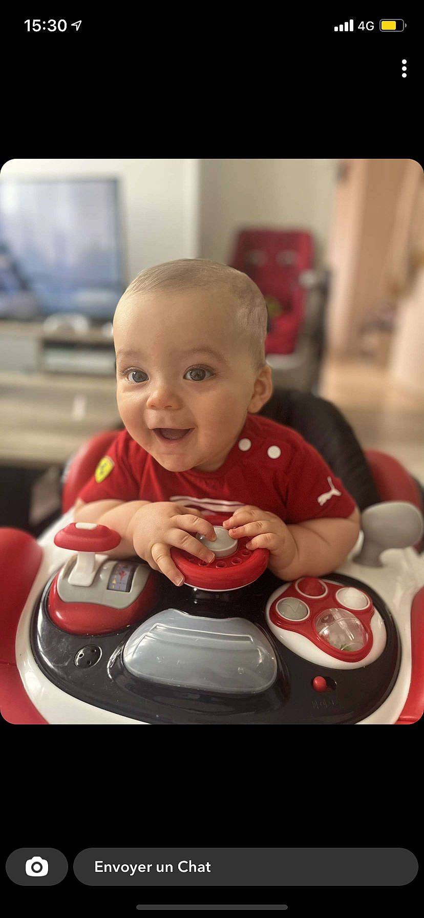 Ezekiel a rejoint le concours — aidez-le/la à gagner de superbes lots ! automotive_design, automotive_lighting, baby, cheek, child, chin, eye, face, fun, gadget, happy, head, motor_vehicle, mouth, person, sitting, skin, smile, snapshot, toddler