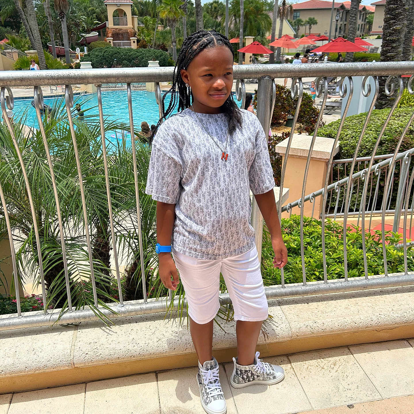 Myari is registered to the contest to win money with this photo: accessories, beachwear, child, clothing, face, female, footwear, girl, head, palmtree, person, photography, plant, portrait, shoe, shorts, sleeve, standing, summer, tree