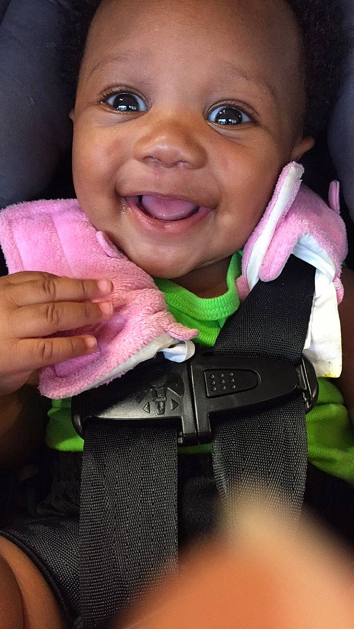 Rylee is registered to the contest to win money with this photo: baby, cheek, child, child_model, face, facial_expression, finger, forehead, fun, hand, happy, joy, lip, mouth, nose, person, photography, pink, skin, smile