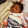 London is registered to the contest to win money with this photo: baby, sleeping, blanket, pajamas, face, hand, bed, cozy, infant, child, comfort, soft, rest, peaceful, indoors, cute, warm, fluffy, striped_blanket, toy