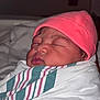 newborn, baby, sleeping, wrapped, blanket, pink_hat, infant, face, cute, hospital, swaddled, peaceful, child, portrait, cozy, soft, tiny, human, newborn_baby, closeup