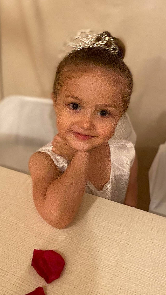 Nevaeh is registered to the contest to win money with this photo: arm, dress, ear, eyebrow, eyelash, finger, flash_photography, gesture, hairstyle, hand, happy, head, headpiece, iris, joy, lip, neck, person, skin, smile