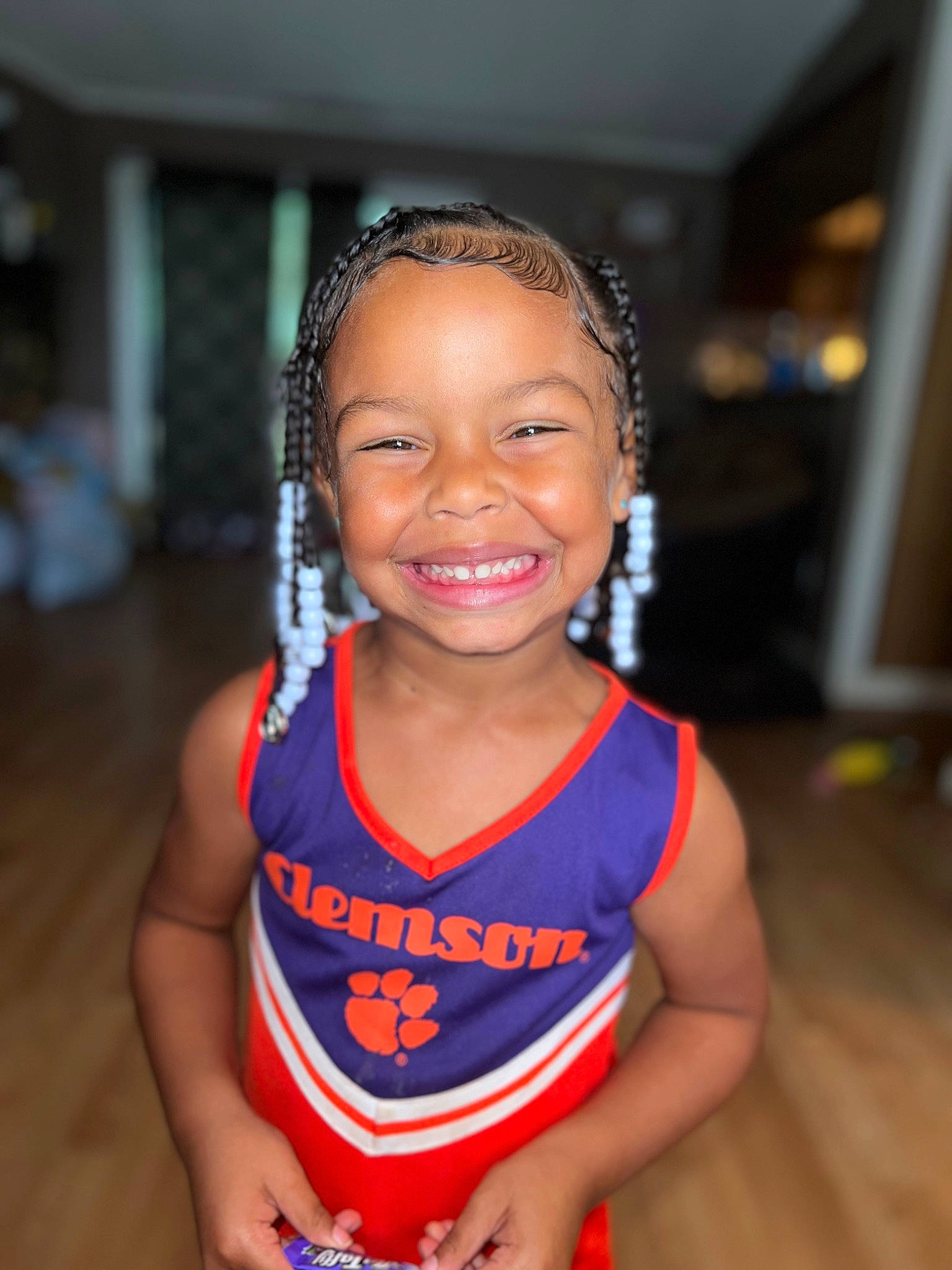 Ava-hope is registered to the contest to win money with this photo: abdomen, black_hair, cheerleading_uniform, chest, chin, competition_event, event, eyebrow, fun, hair, happy, human_leg, jersey, joy, long_hair, neck, person, smile, sports_uniform, sportswear