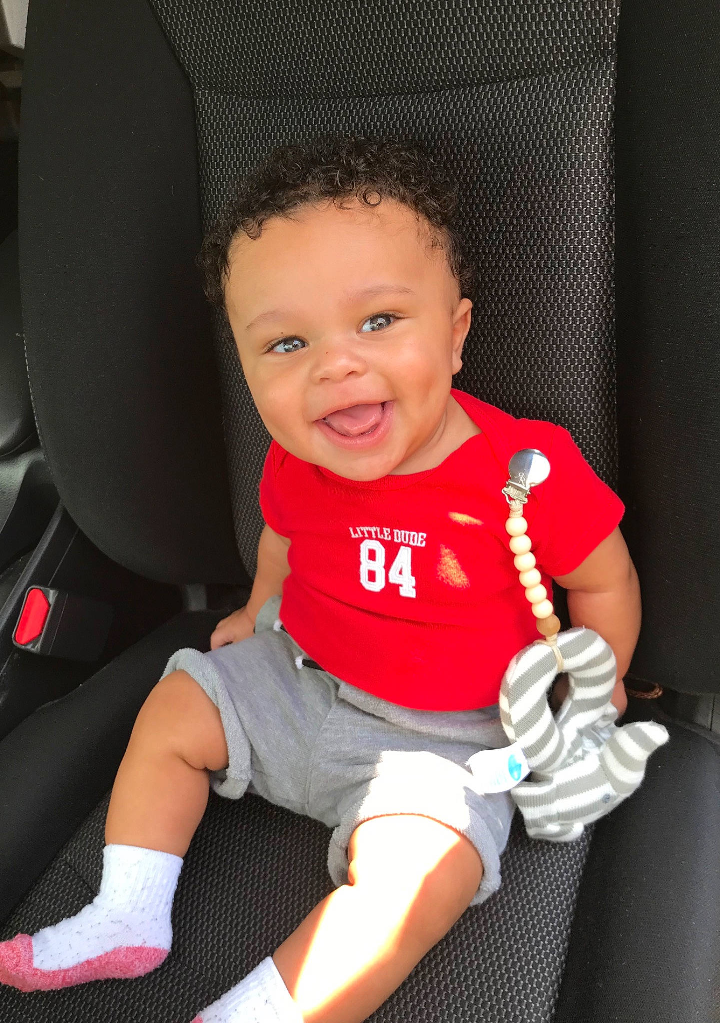 Jabari joined the competition — help win amazing prizes! arm, baby, baby_carriage, baby_in_car_seat, baby_products, baby_toddler_clothing, child, person, product, sitting, skin, smile, toddler