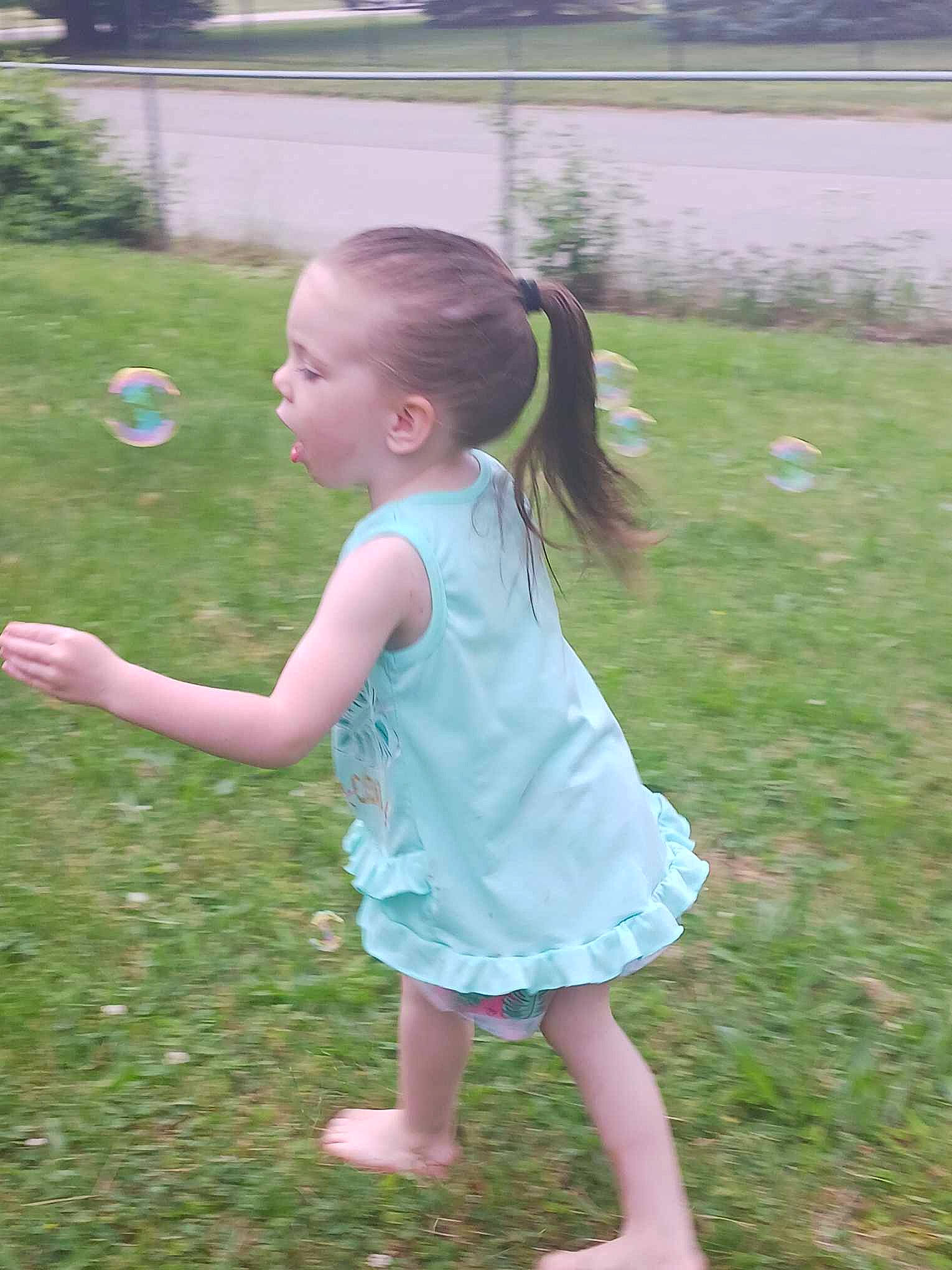 Phoenyx is registered to the contest to win money with this photo: baby_toddler_clothing, balloon, barefoot, child, event, foot, fun, garden, grass, grassland, happy, lawn, leisure, people_in_nature, person, plant, play, recreation, toddler, vacation