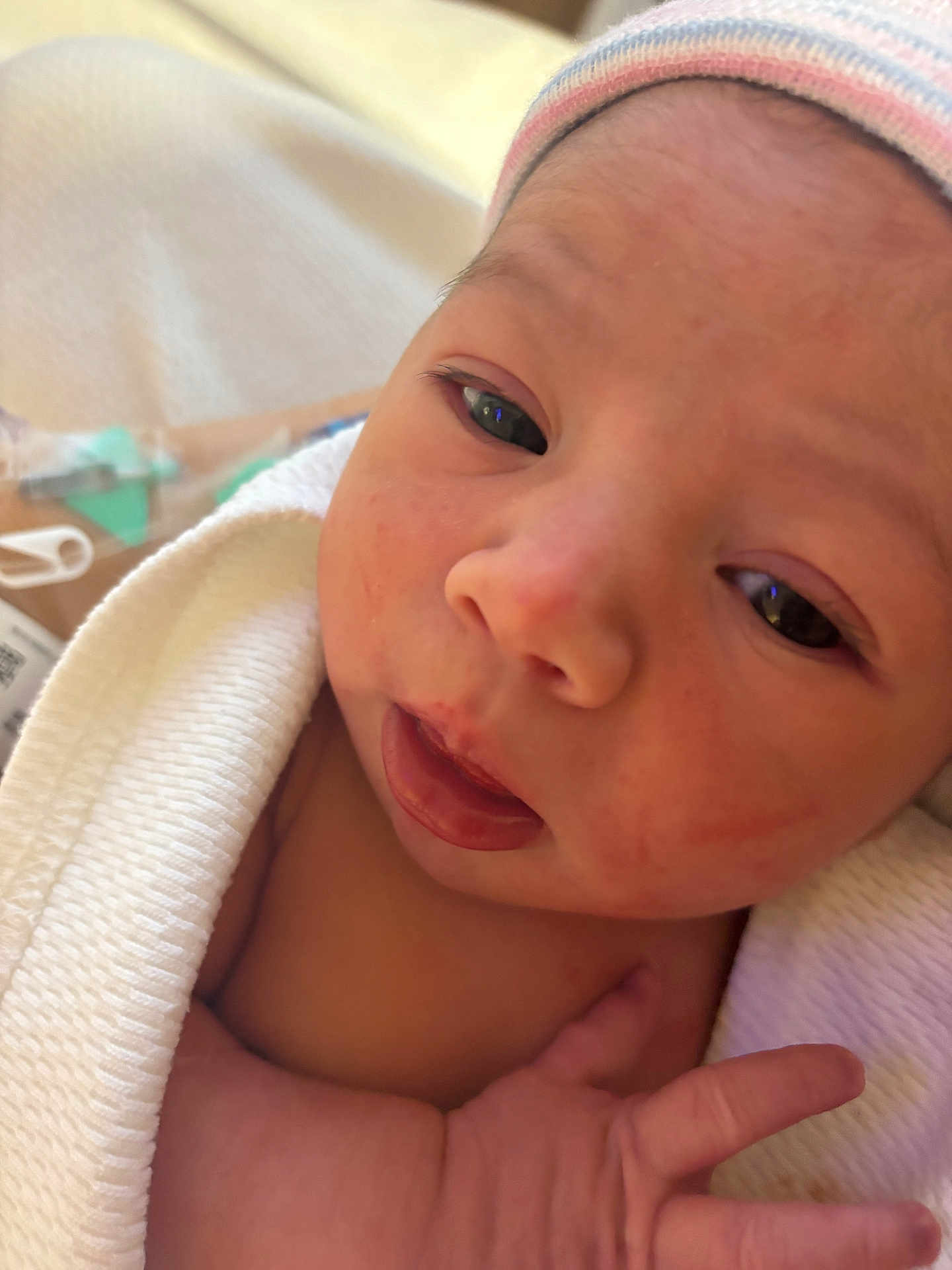 Isella is registered to the contest to win money with this photo: newborn, baby, infant, face, hand, blanket, hat, skin, closeup, expression, human, child, portrait, newborn_baby, wrapped, cute, small, soft, warm, sleepy