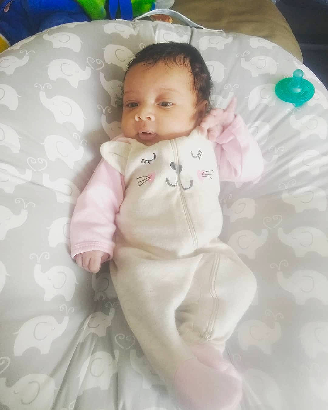 Sofia is registered to the contest to win money with this photo: baby, baby_products, bedding, blanket, cheek, child, eye, fun, head, iris, linens, nose, person, pink, product, skin, smile, textile, toddler