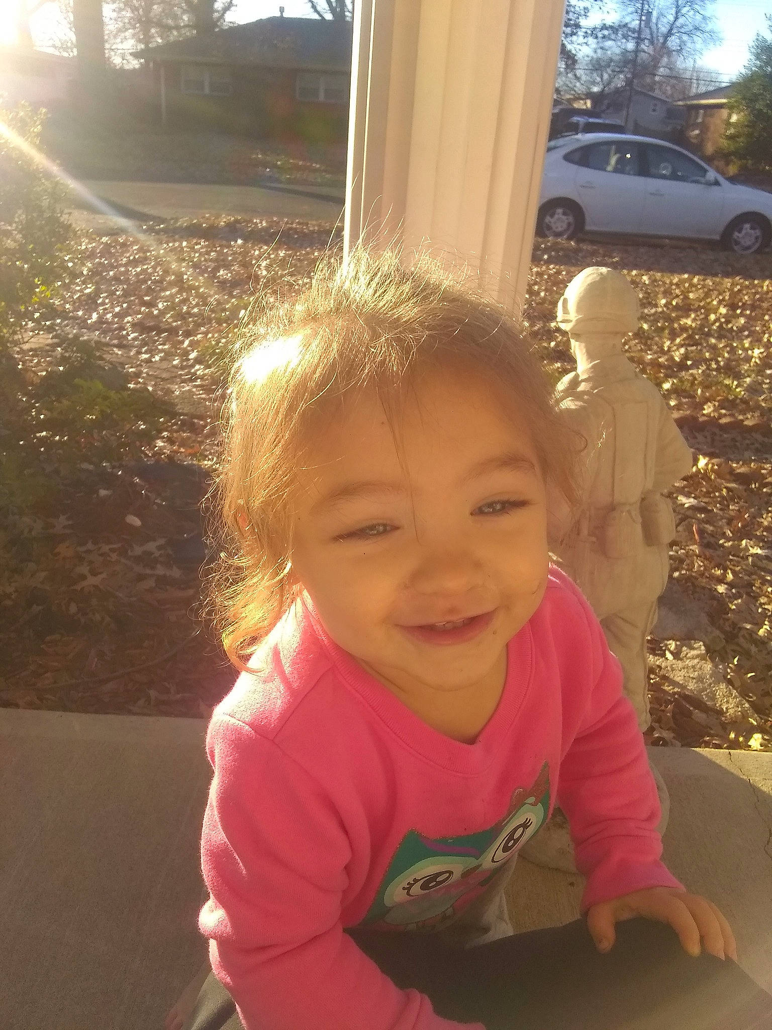 Sarina is registered to the contest to win money with this photo: cheek, child, face, facial_expression, fun, happy, head, joy, person, pink, play, skin, smile, toddler, tree, vacation