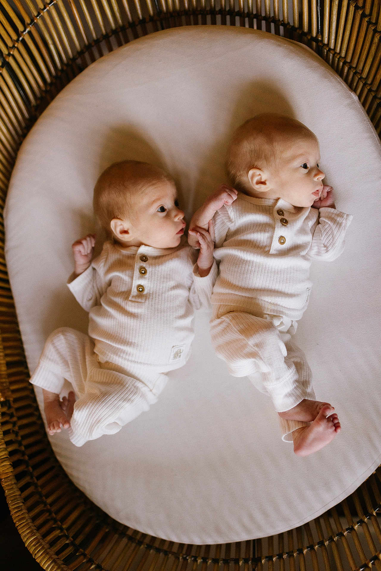 Bristol is registered to the contest to win money with this photo: baby, bed, bodypart, clothing, cradle, crib, face, finger, furniture, hand, head, infantbed, newborn, pants, person, photography, portrait