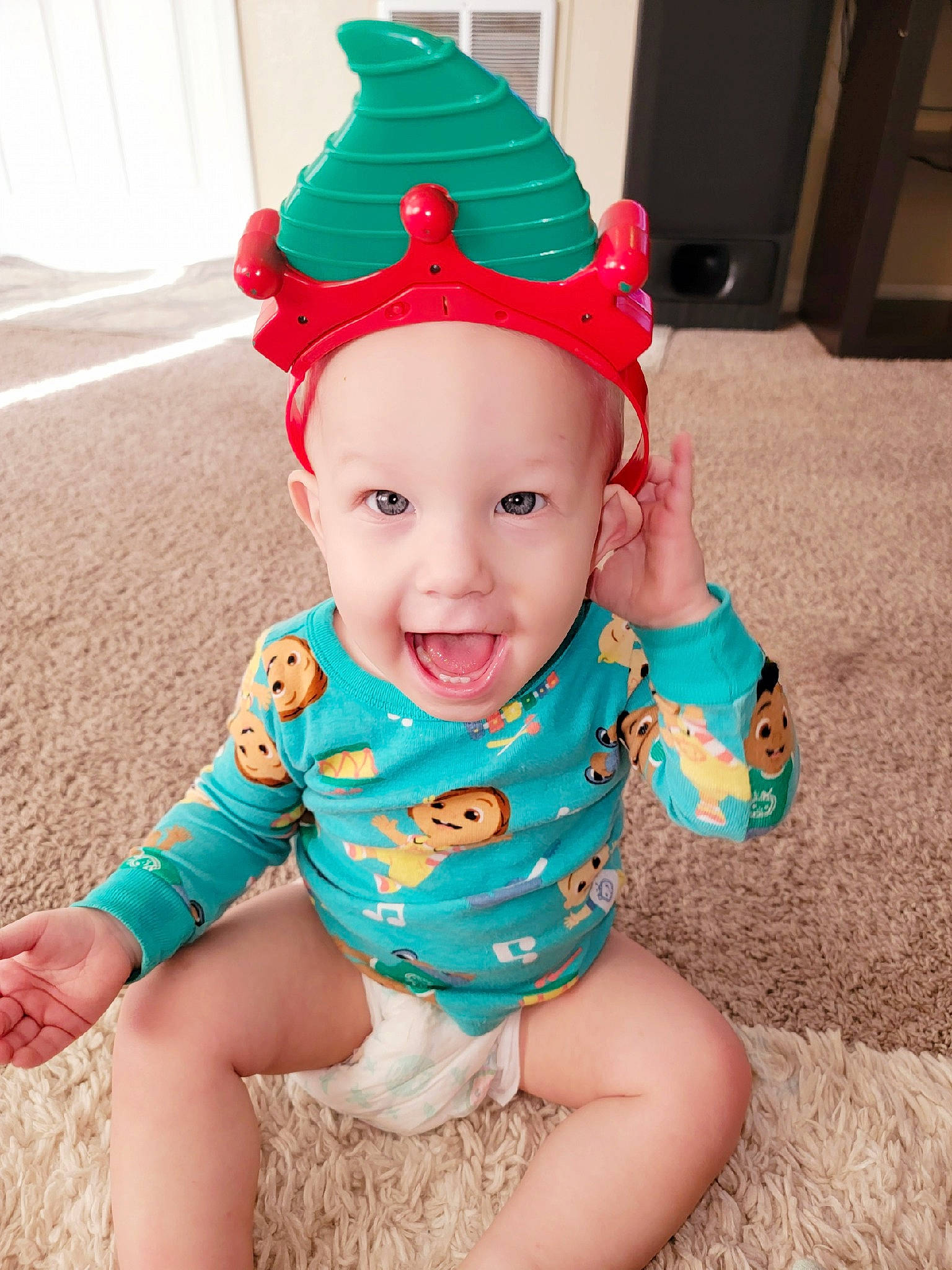 Emerson is registered to the contest to win money with this photo: baby, baby_toddler_clothing, cap, clothing, cool, costume_hat, face, fun, grass, happy, hat, head, headgear, party_supply, person, pink, sleeve, smile, t_shirt, thigh