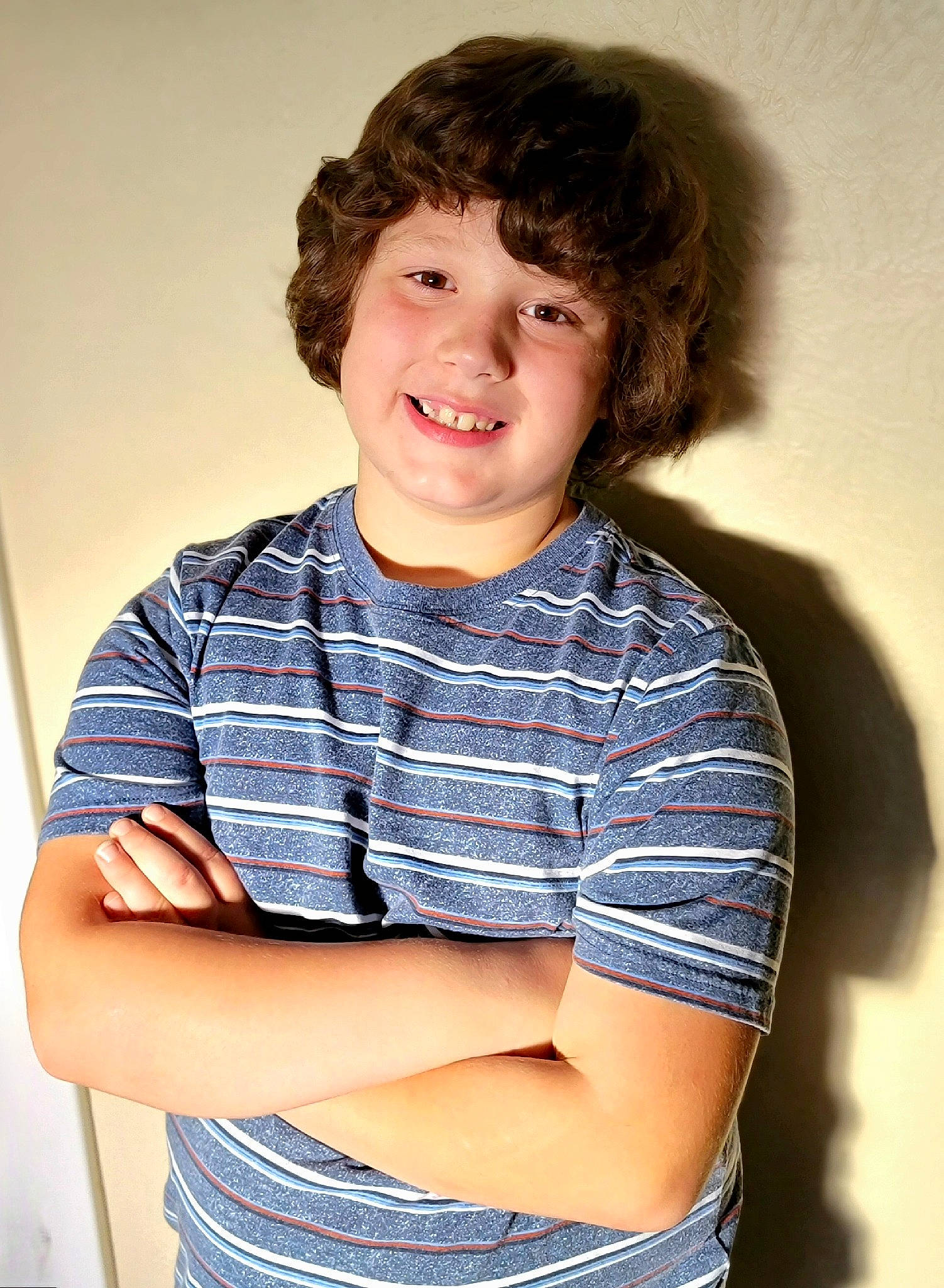 Carter is registered to the contest to win money with this photo: arm, brown_hair, cheek, child, clothing, dress_shirt, elbow, electric_blue, eye, flash_photography, fun, happy, iris, joint, joy, neck, person, shoulder, sleeve, smile