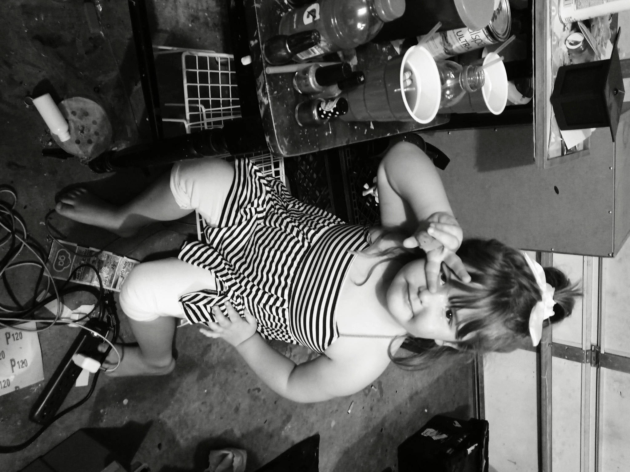 Alyssa Quigley is registered to the contest to win money with this photo: arm, black, black_and_white, elbow, flash_photography, fun, hand, human_leg, knee, monochrome, monochrome_photography, person, room, sandal, sitting, smile, stock_photography, street, style, thigh