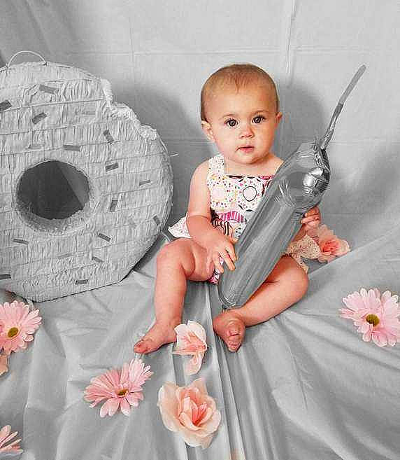 Kaliyah is registered to the contest to win money with this photo: baby, baby_toddler_clothing, chair, child, circle, dress, embellishment, fashion_accessory, flower, linens, pattern, peach, people, person, petal, pink, plant, product, sleeve, textile