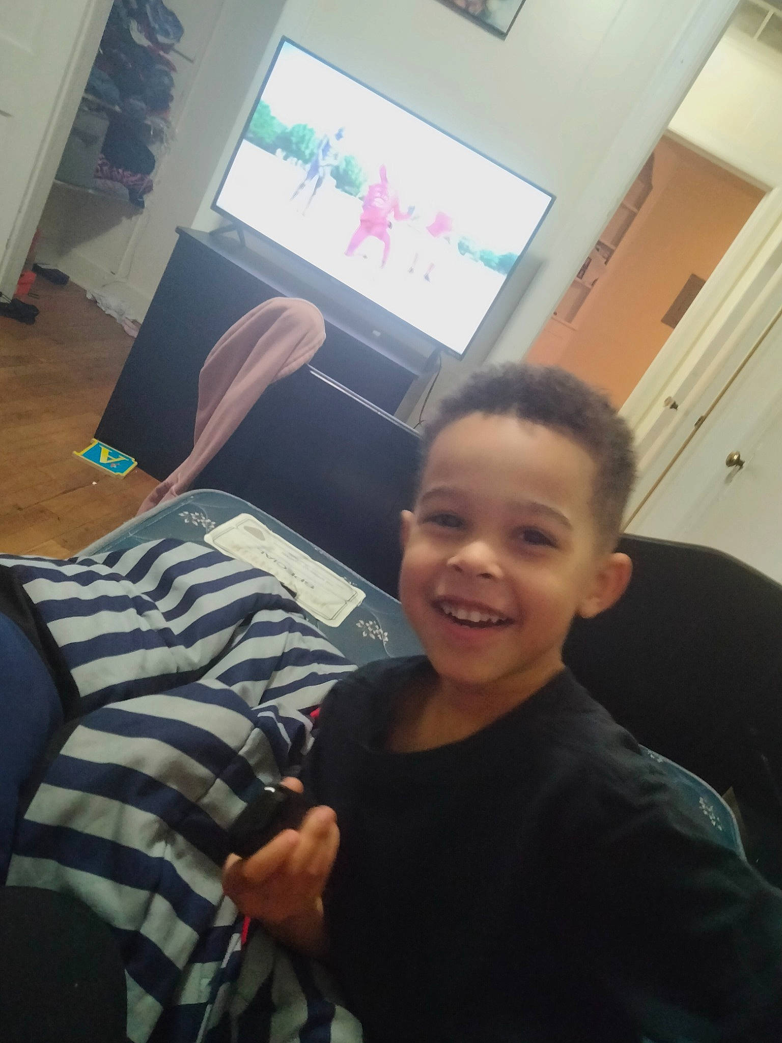 Kobe joined the competition — help win amazing prizes! comfort, cool, curtain, elbow, electronic_device, finger, floor, flooring, fun, gesture, happy, joint, joy, person, shoulder, smile, standing, t_shirt, thumb, toddler