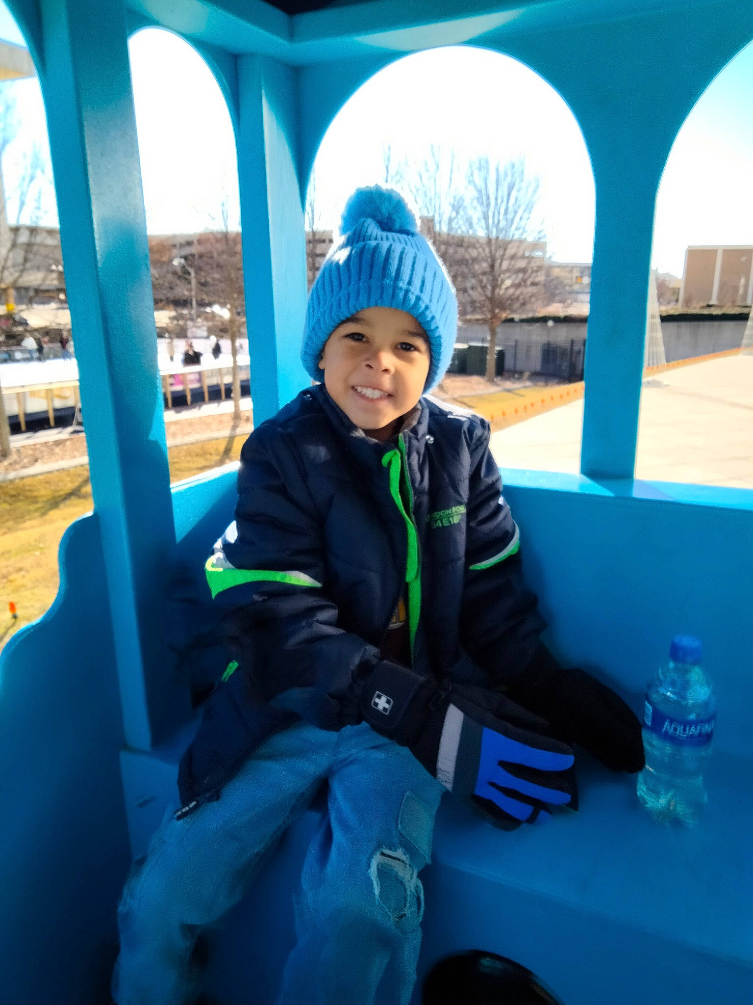 Kobe joined the competition — help win amazing prizes! azure, blue, bottle, cap, comfort, electric_blue, fun, glove, headwear, helmet, jacket, joy, leisure, person, personal_protective_equipment, recreation, sitting, sky, smile, travel