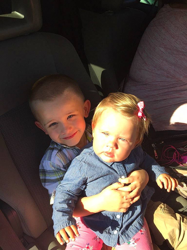 Dominick joined the competition — help win amazing prizes! baby, baby_carriage, baby_products, car, car_seat, cheek, child, electronic_device, fun, interaction, joy, lap, person, product, sibling, sitting, skin, smile, toddler, vacation