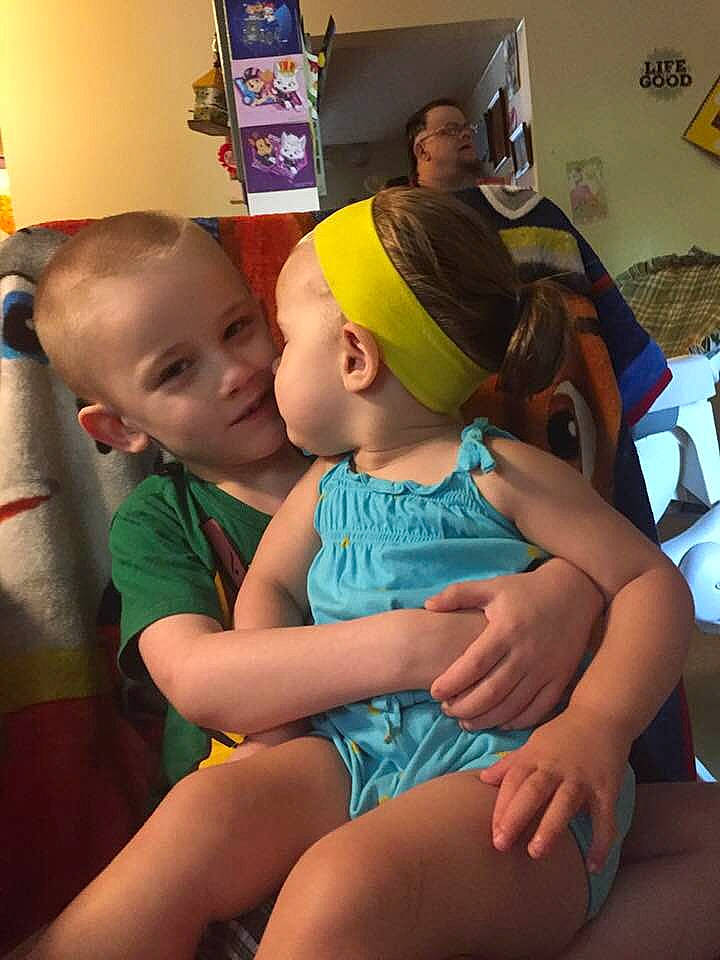 Dominick is registered to the contest to win money with this photo: child, finger, fun, lap, leg, person, thigh, toddler