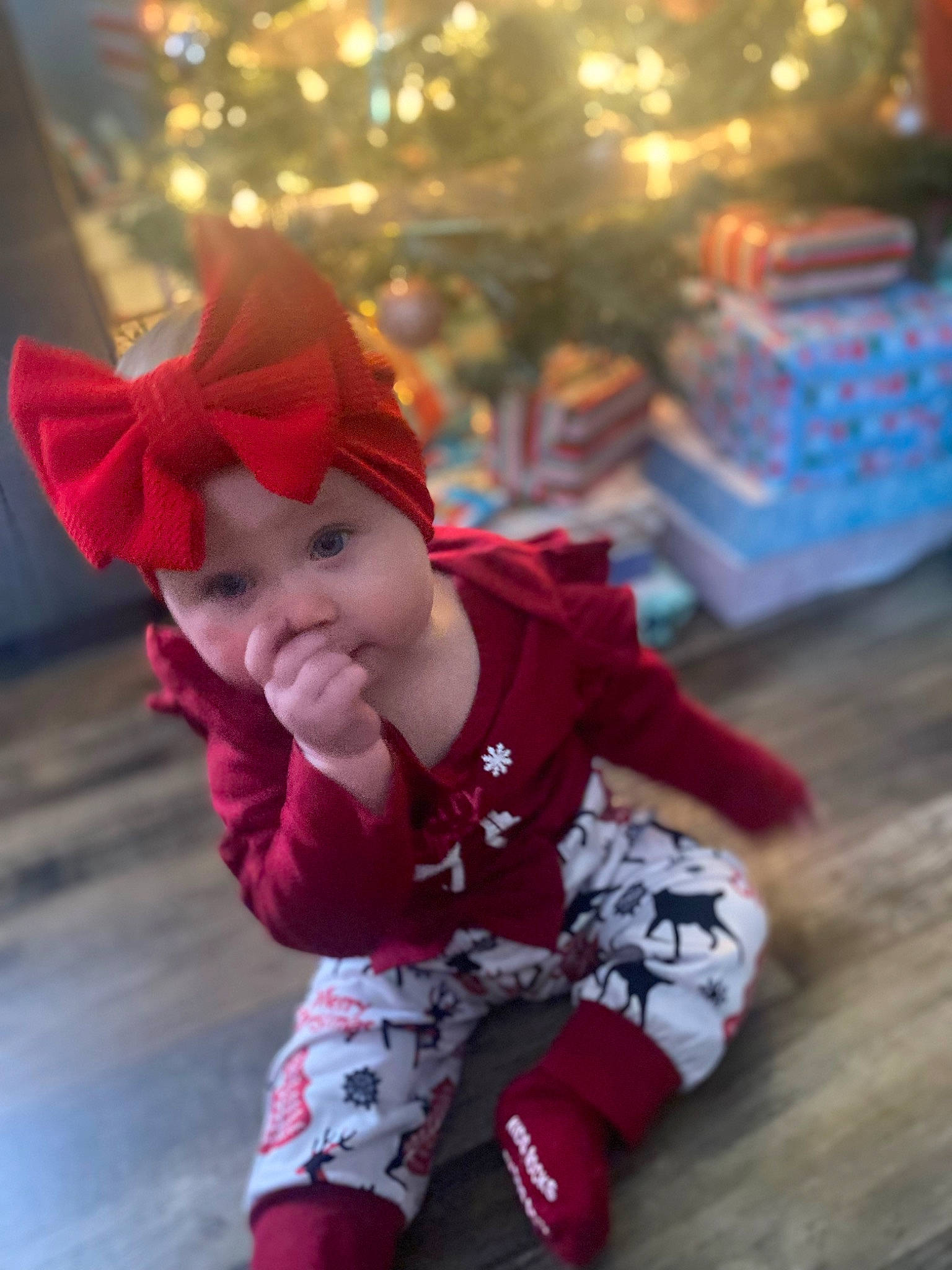 Leanne is registered to the contest to win money with this photo: baby, baby_toddler_clothing, child, christmas_ornament, event, eye, face, fun, happy, hat, headwear, holiday, leisure, magenta, person, purple, sleeve, smile, toddler, tree