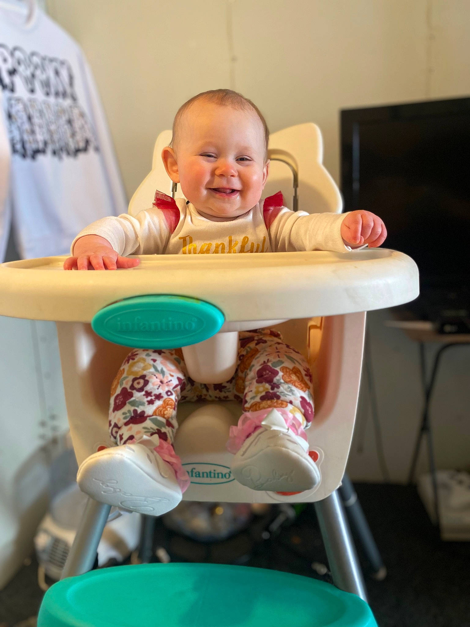 Leanne is registered to the contest to win money with this photo: baby, baby_laughing, baby_products, baby_safety, baby_toddler_clothing, child, comfort, fun, happy, human_leg, laugh, mouth, person, play, room, sitting, smile, t_shirt, thigh, toddler
