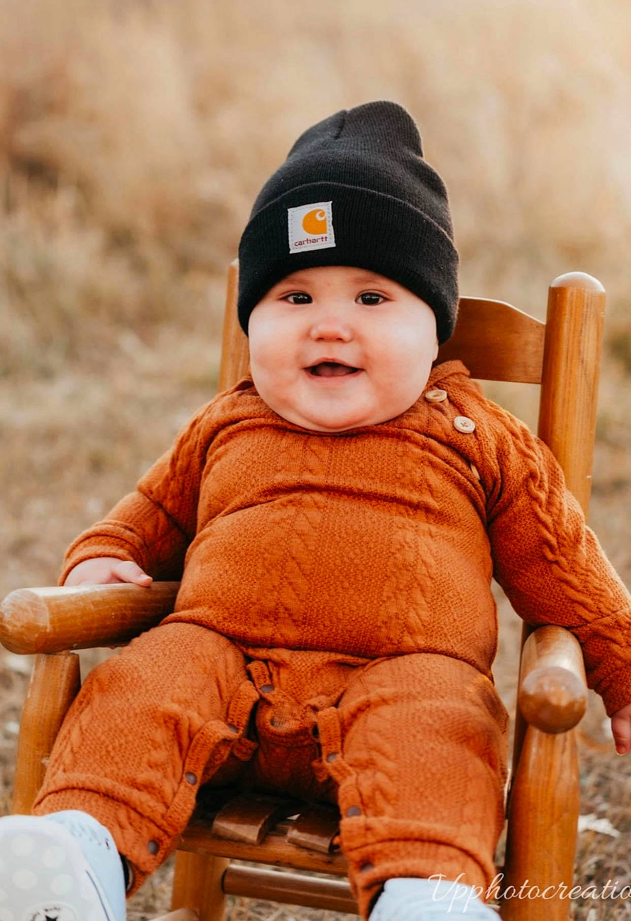 Gianni joined the competition — help win amazing prizes! baby, baby_toddler_clothing, cap, cheek, child, face, facial_expression, grass, happy, headgear, headwear, jacket, outerwear, person, sitting, skin, sleeve, smile, standing, toddler