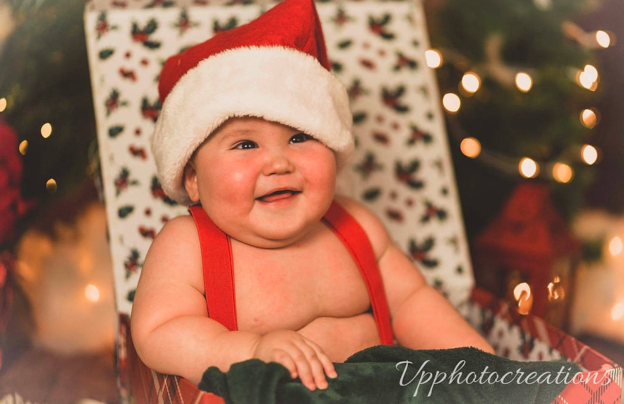 Gianni joined the competition — help win amazing prizes! baby, baby_toddler_clothing, beauty, child, christmas, christmas_decoration, christmas_eve, christmas_ornament, event, facial_expression, fictional_character, fun, happy, headwear, holiday, joy, ornament, person, santa_claus, smile