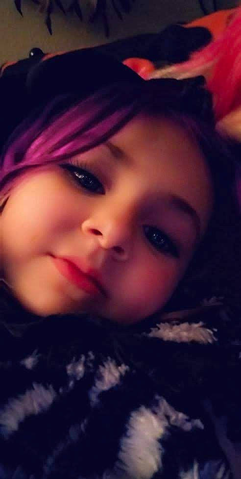 Devon is registered to the contest to win money with this photo: bangs, black_hair, cheek, chin, cool, eyebrow, eyelash, flash_photography, forehead, fun, happy, iris, jaw, lip, mouth, nose, person, purple, skin, tints_and_shades