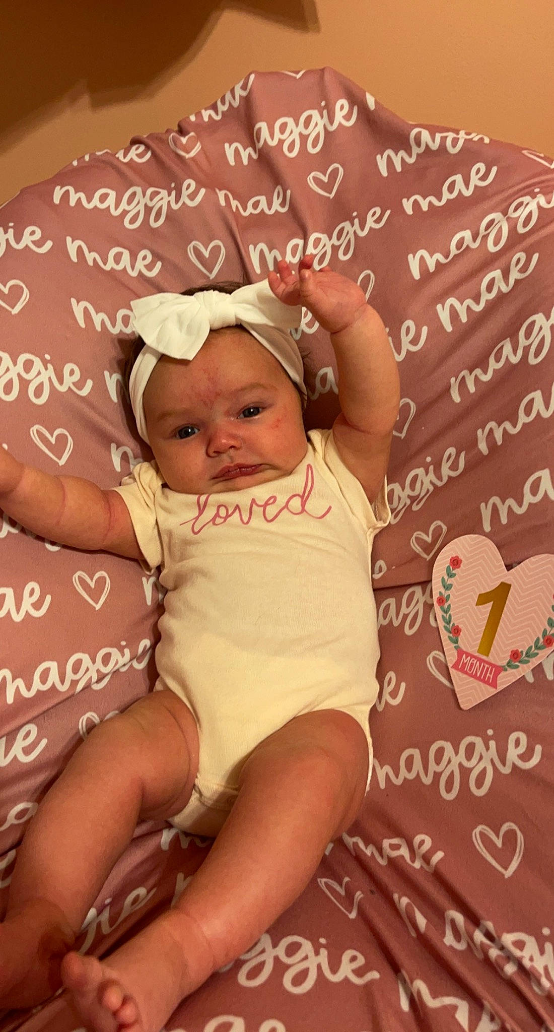 Maggie joined the competition — help win amazing prizes! baby, baby_toddler_clothing, cap, cheek, child, comfort, face, facial_expression, finger, font, happy, hat, headgear, headwear, human, pattern, person, pink, product, skin