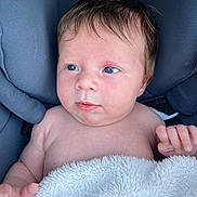 éléonore a rejoint le concours — aidez-le/la à gagner de superbes lots ! baby, infant, face, skin, blanket, cushion, seat, blue_eyes, hair, hand, fingers, closeup, portrait, newborn, soft_texture, indoors, child, person, cute, resting