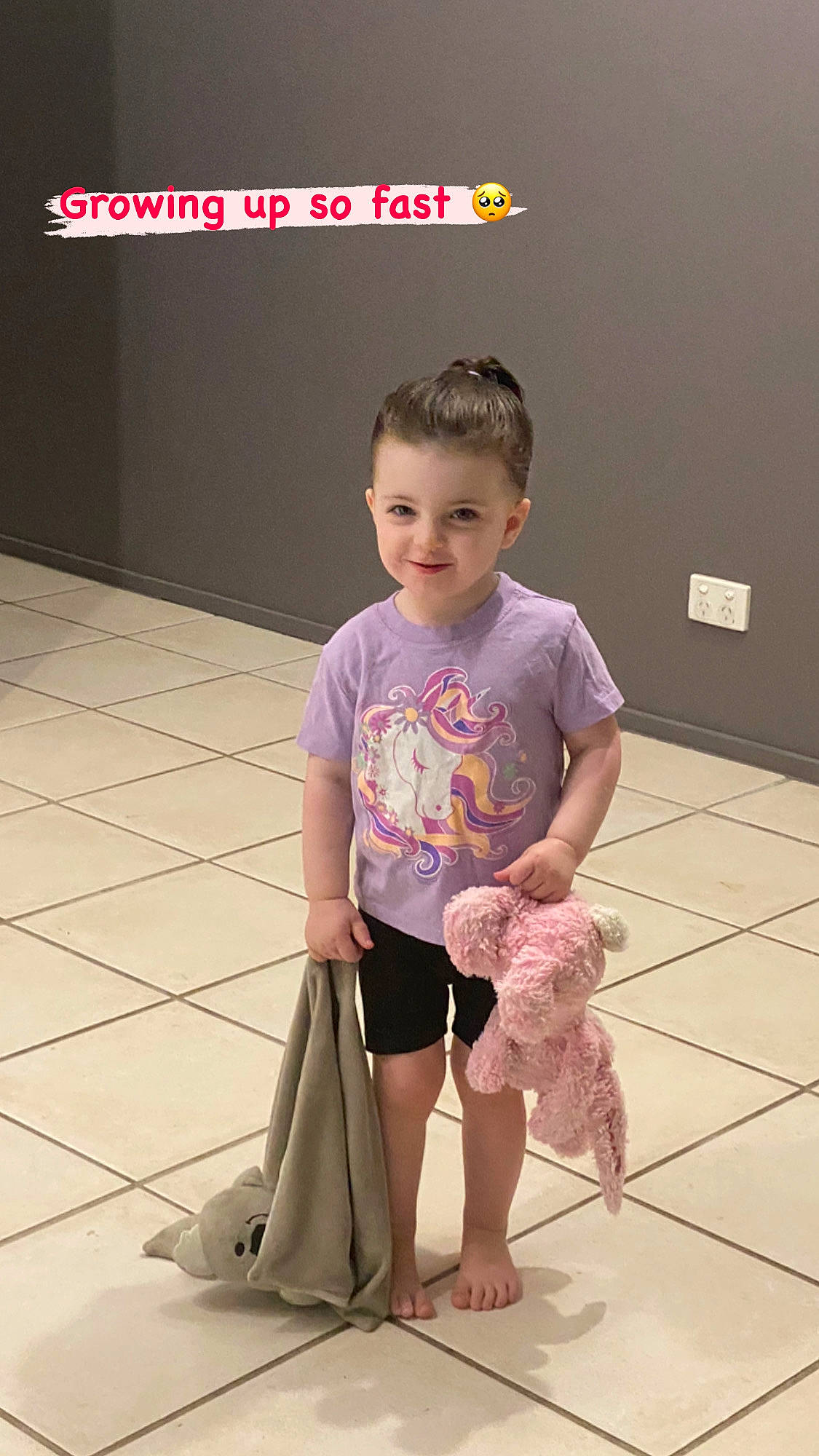 Scout is registered to the contest to win money with this photo: barefoot, cleanliness, floor, flooring, foot, fun, happy, household_supply, human_body, human_leg, joint, joy, knee, leg, person, shoulder, skin, sleeve, smile, standing