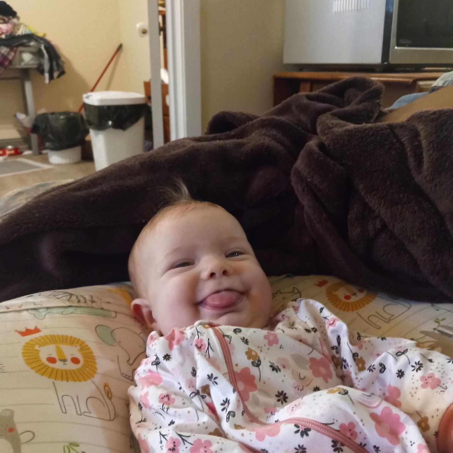 Bonnie is registered to the contest to win money with this photo: baby, bed, bedroom, blanket, computerhardware, couch, electronics, face, furniture, hardware, head, indoors, monitor, person, photography, portrait, quilt, room, screen, tv
