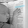 baby, sleeping, hand, bible, book, text, highlight, black_and_white, peaceful, infant, bedtime, religion, scripture, closeup, portrait, child, soft, blanket, clothing, faith