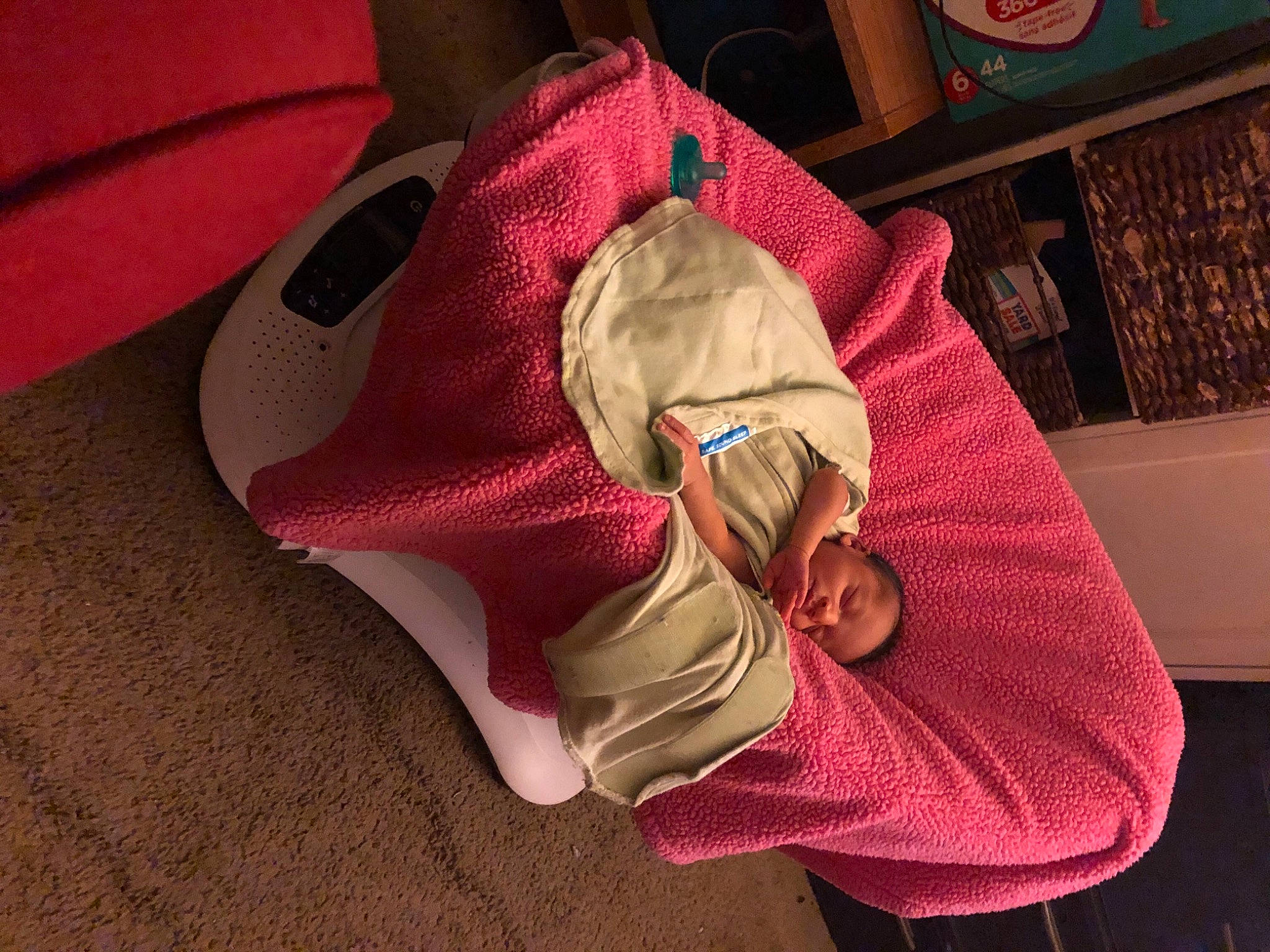 Carmen is registered to the contest to win money with this photo: baby, baby_products, bag, carmine, child, comfort, fashion_accessory, flooring, fun, human_leg, knee, linens, magenta, person, picture_frame, pink, sitting, tints_and_shades, toddler, wood