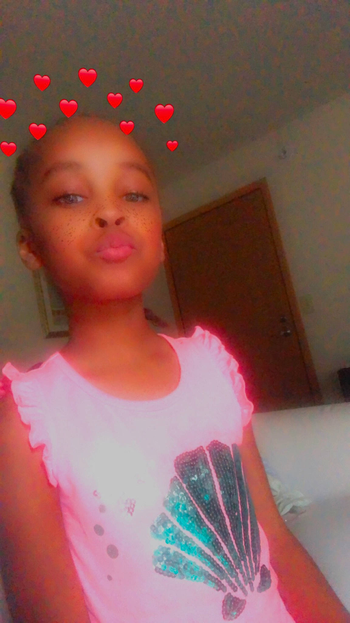 Aaliyah is registered to the contest to win money with this photo: cheek, child, chin, dress, eyebrow, eyelash, fashion_design, fun, hair, happy, human, lighting, lip, magenta, neck, person, pink, red, skin, t_shirt